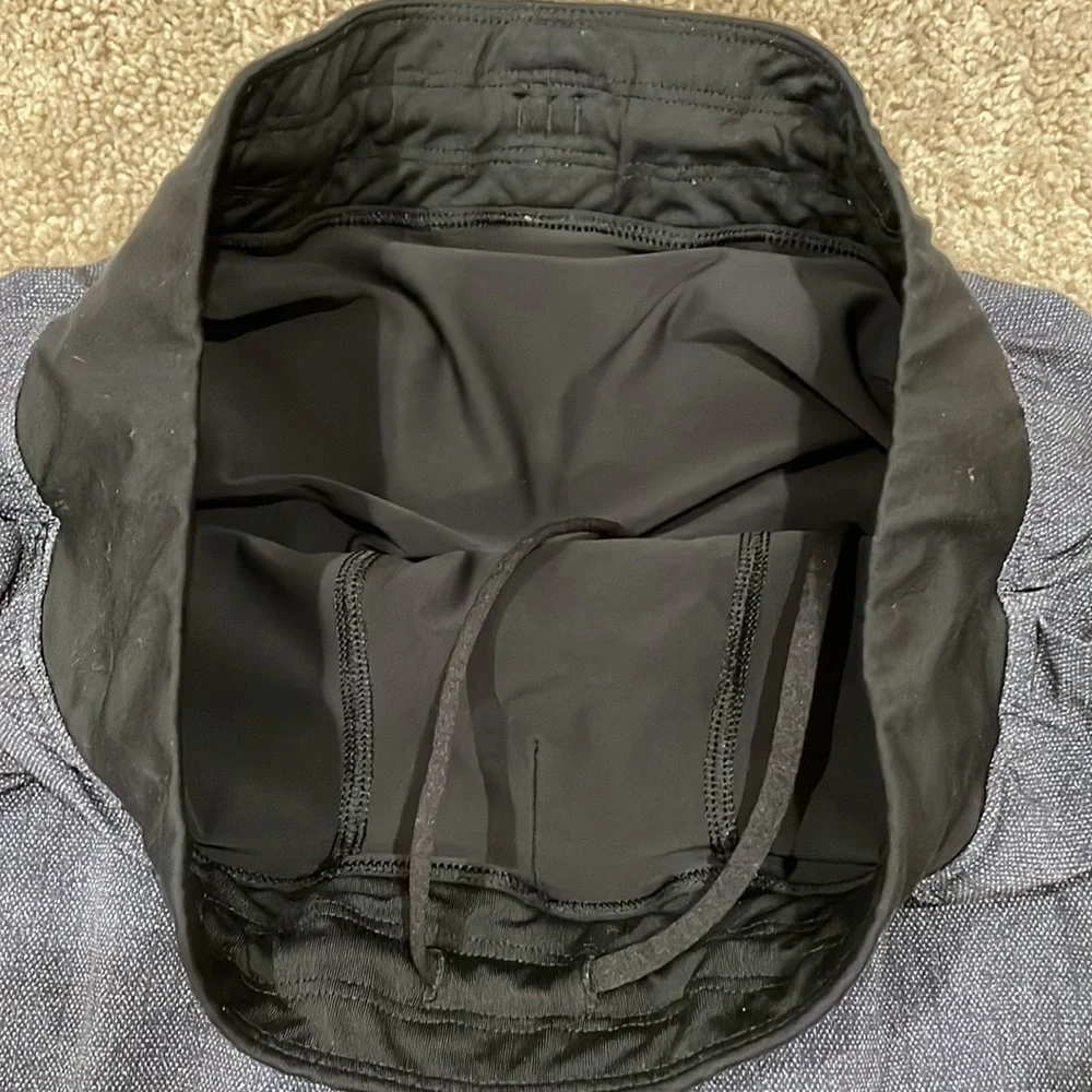 Lululemon Dark gray and black mens shorts.